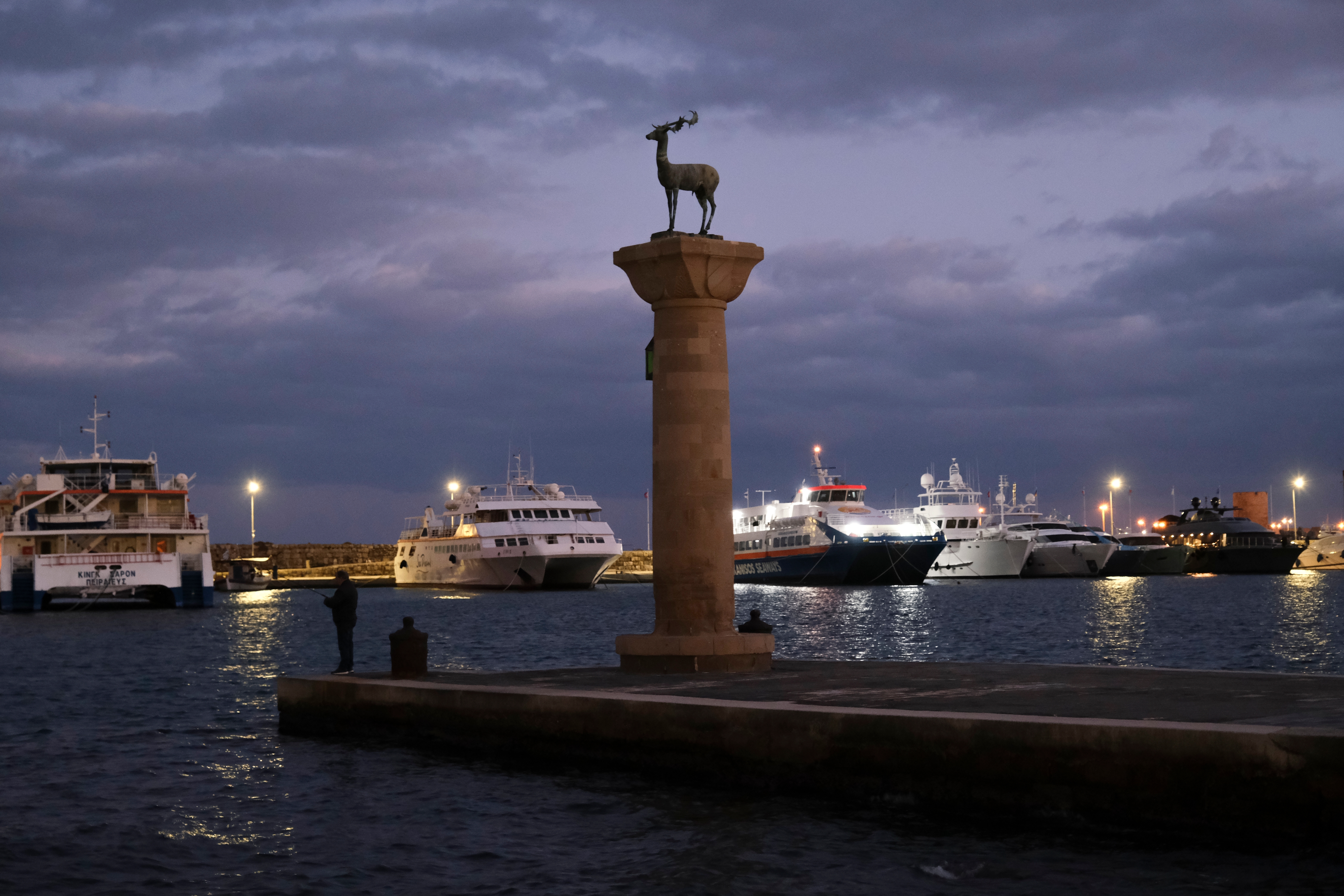 Mandraki port in Rhodes with deers statue, where The Colossus was standing